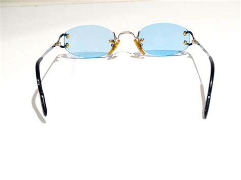 1990s Rimless Cartier Blue Lens Sunglasses 